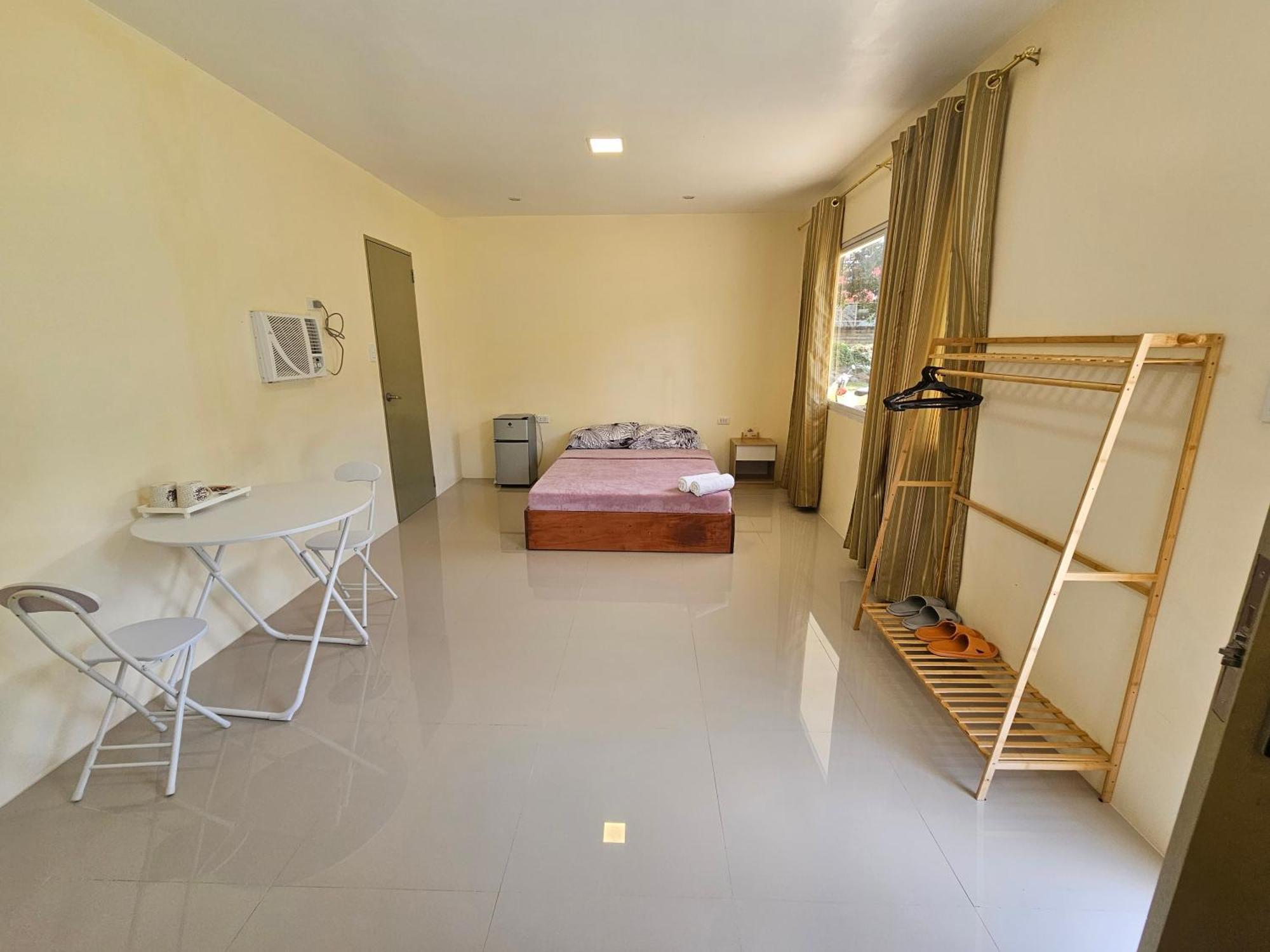 Summer Room B Dumaguete City Номер фото